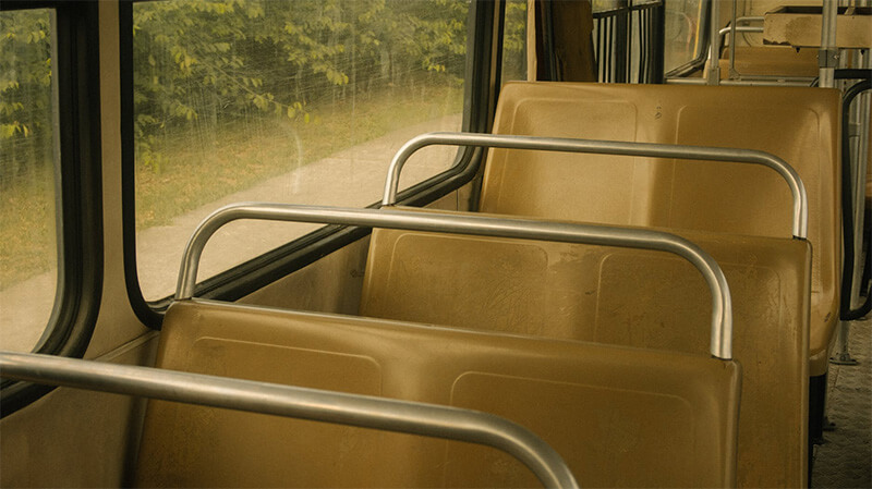 Empty seats on a school bus.