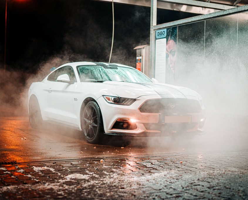 White car going through car wash